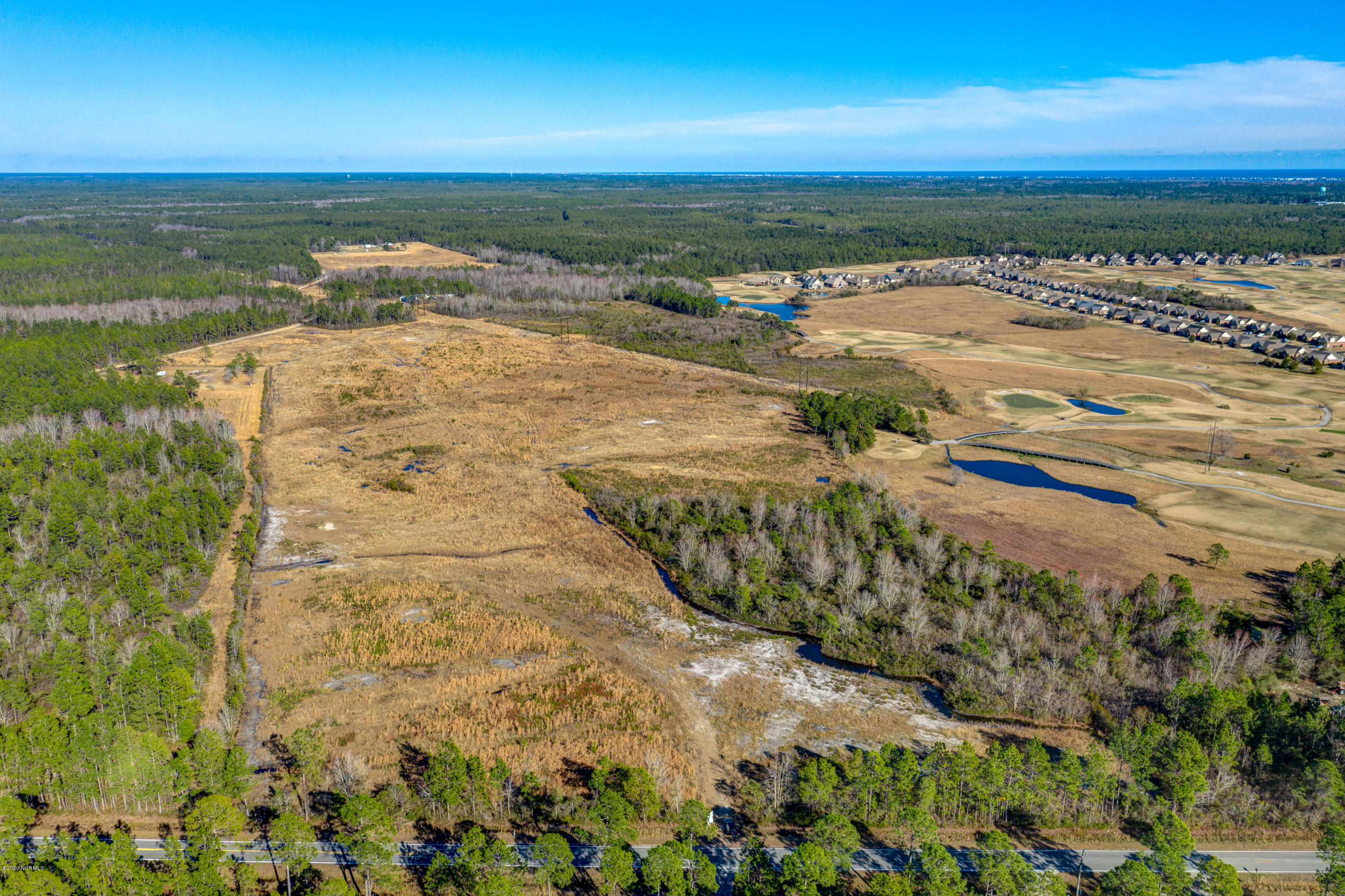 890 Wolf Pond Road Hampstead, NC 28443 - Photo 2 of 11 DJI_0206_07_08_09_10
