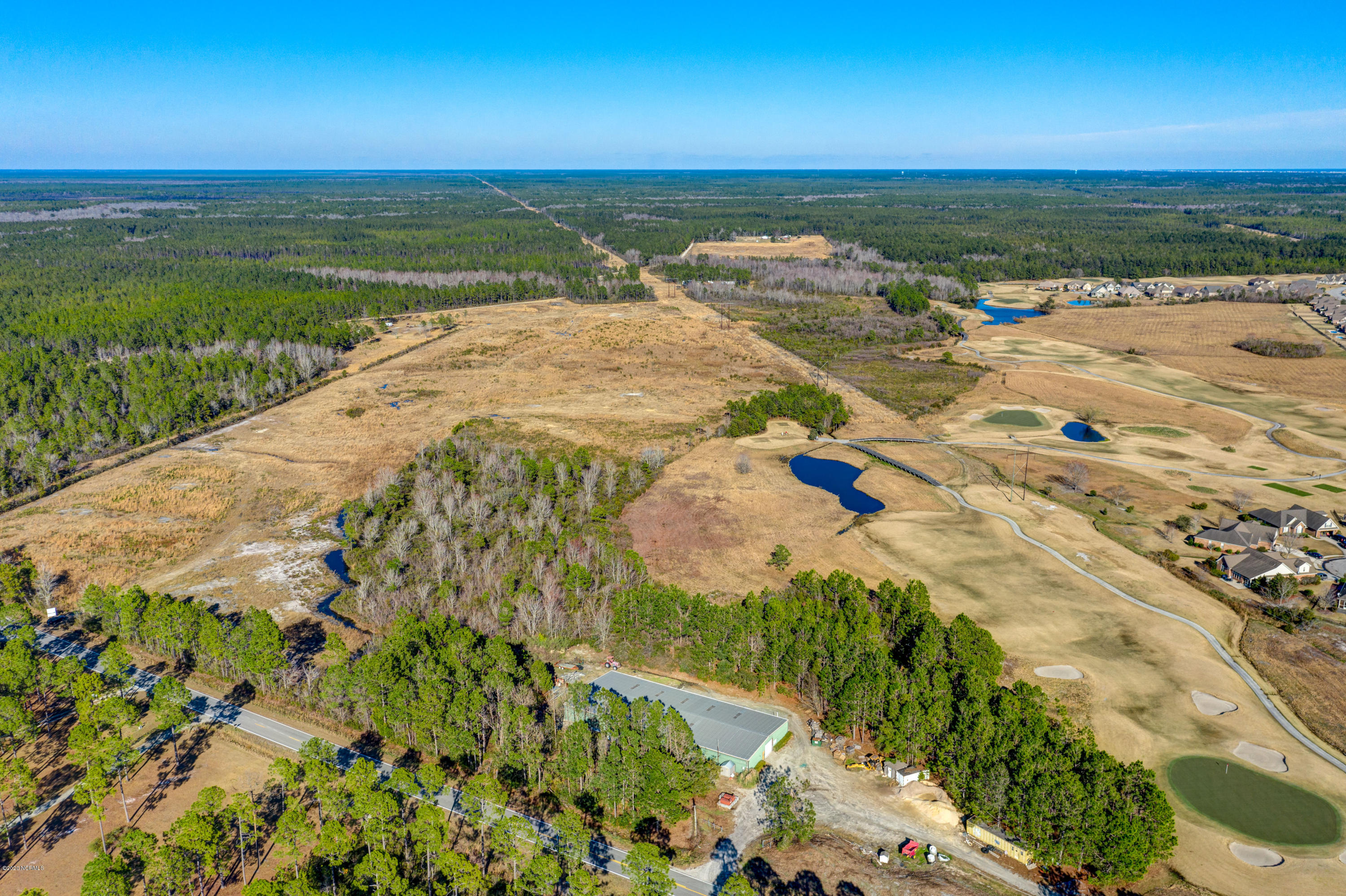 890 Wolf Pond Road Hampstead, NC 28443 - Photo 3 of 11 DJI_0211_2_3_4_5