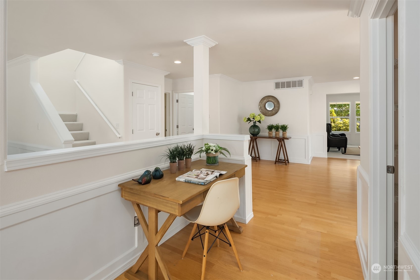 9222 Northeast 173rd Place Bothell, WA 98011 - Photo 15 of 37 a view of a dining room with furniture and wooden floor