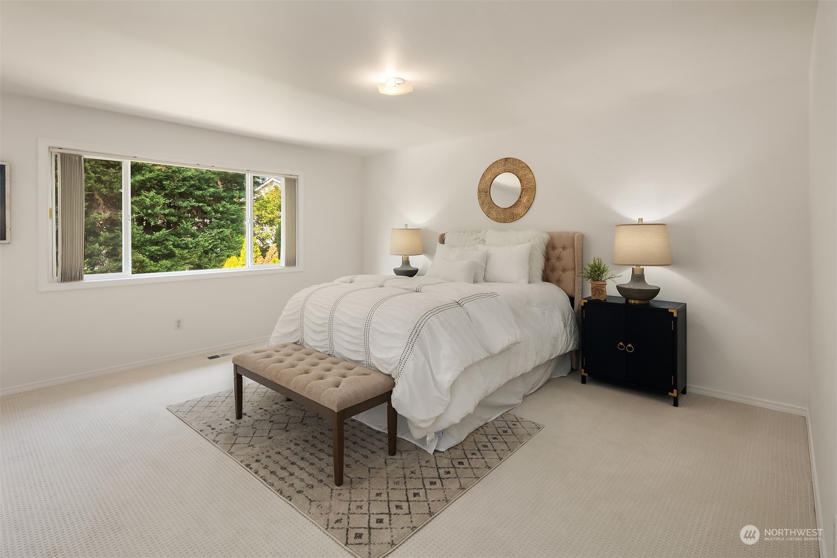 9222 Northeast 173rd Place Bothell, WA 98011 - Photo 16 of 37 a bedroom with a bed and a window