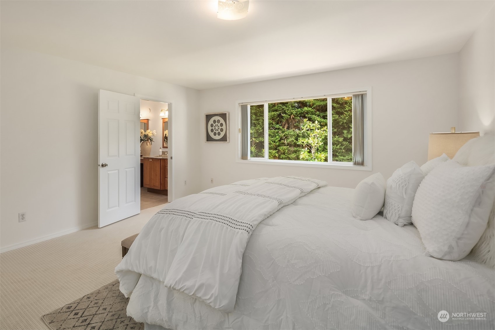 9222 Northeast 173rd Place Bothell, WA 98011 - Photo 17 of 37 a bedroom with a bed and a window