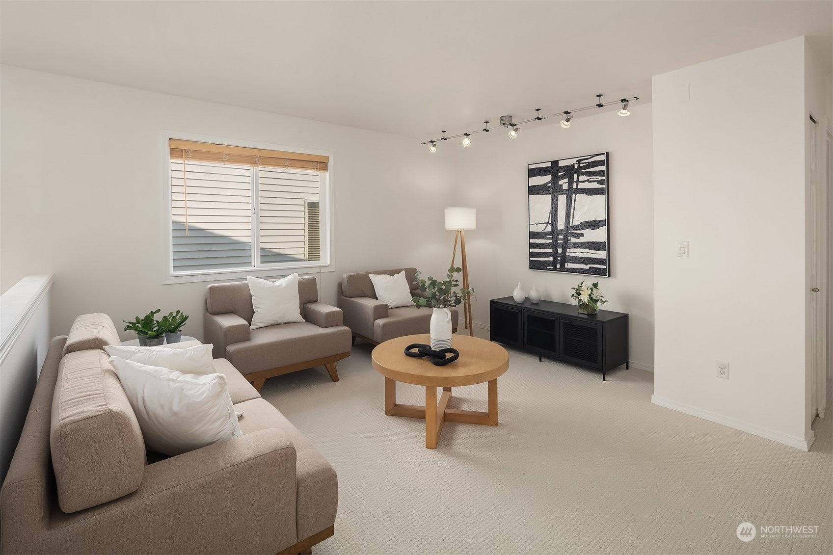 9222 Northeast 173rd Place Bothell, WA 98011 - Photo 20 of 37 a living room with furniture a rug and a window
