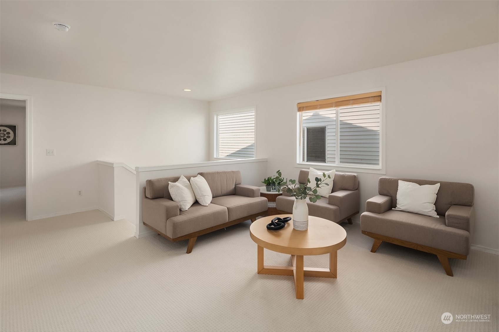 9222 Northeast 173rd Place Bothell, WA 98011 - Photo 21 of 37 a living room with furniture and a large window