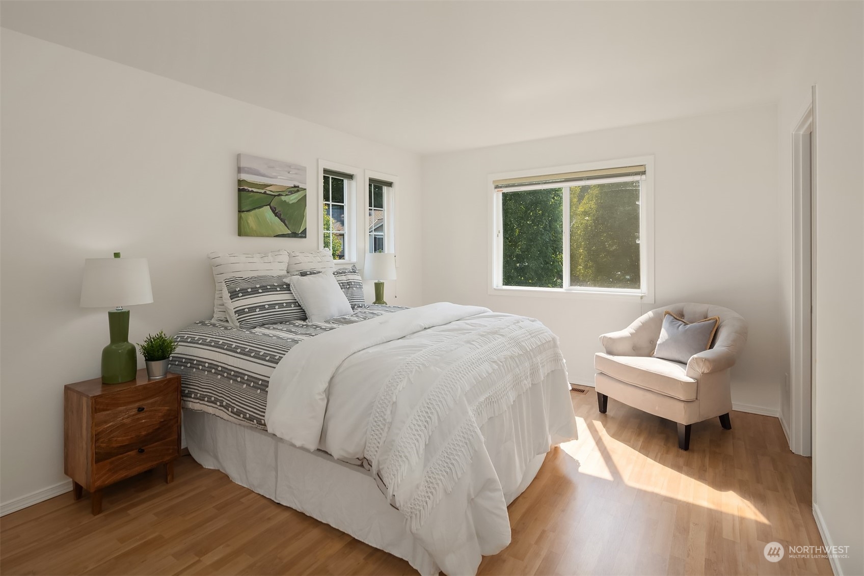 9222 Northeast 173rd Place Bothell, WA 98011 - Photo 22 of 37 a bedroom with a bed and a couch