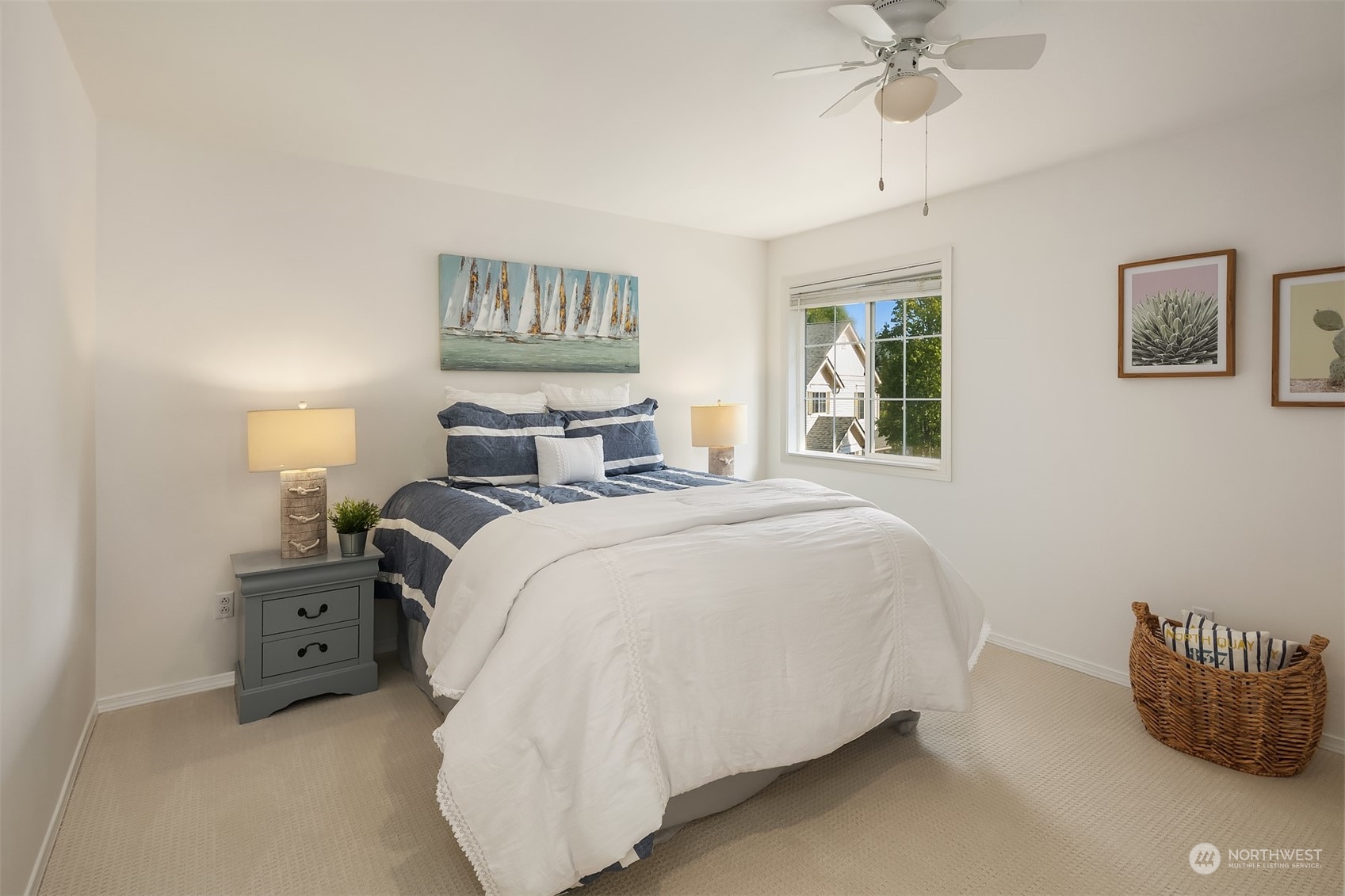 9222 Northeast 173rd Place Bothell, WA 98011 - Photo 24 of 37 a bedroom with a bed and a chandelier