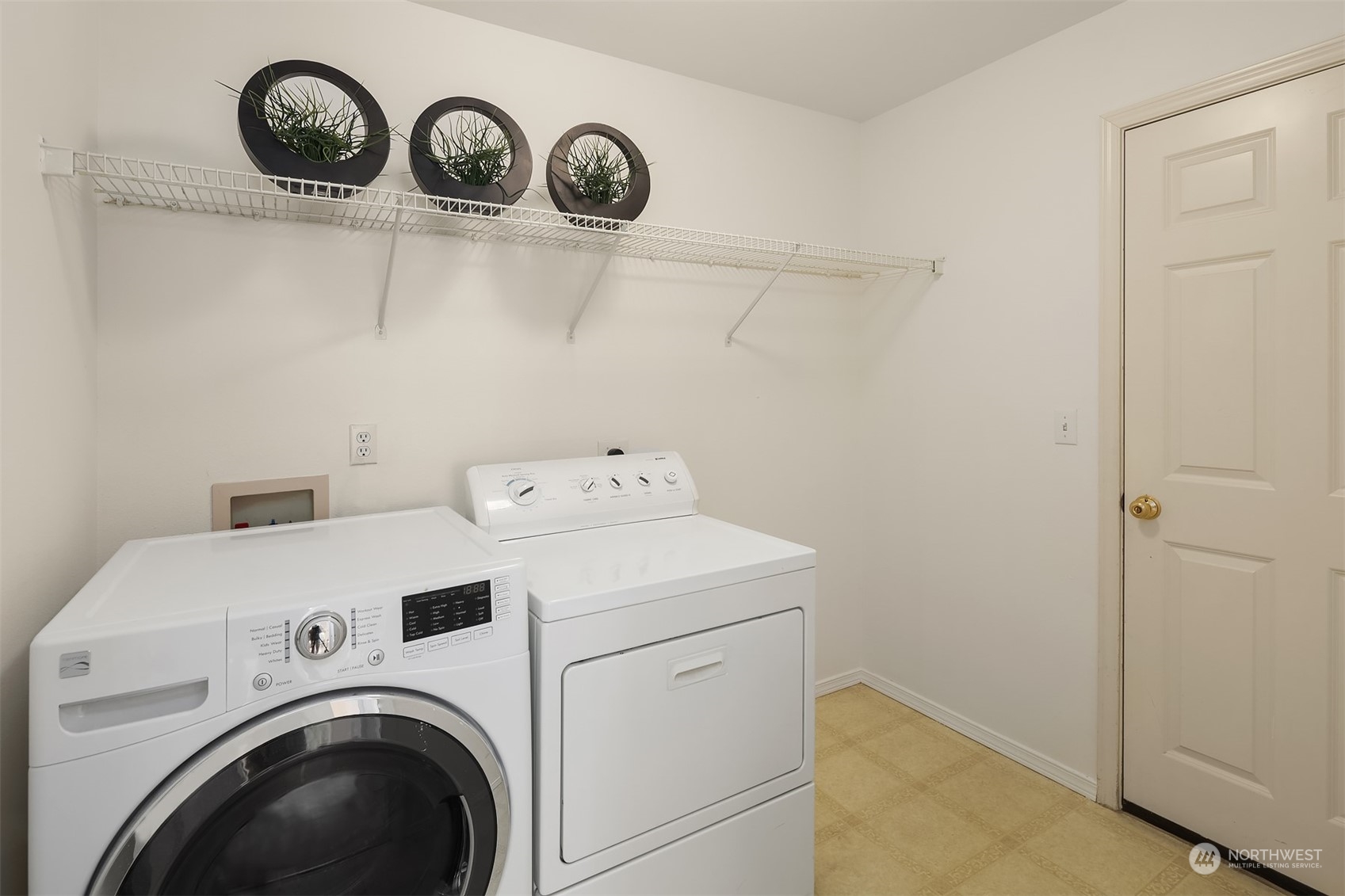 9222 Northeast 173rd Place Bothell, WA 98011 - Photo 27 of 37 a utility room with dryer and washer
