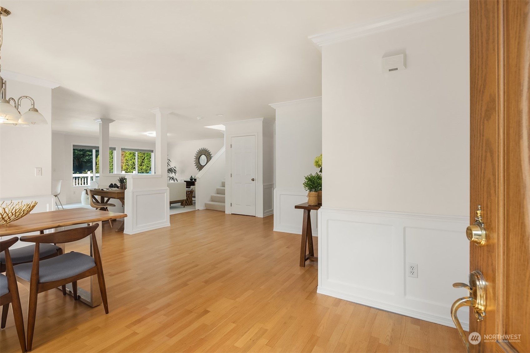 9222 Northeast 173rd Place Bothell, WA 98011 - Photo 28 of 37 a living room with furniture a table and wooden floor
