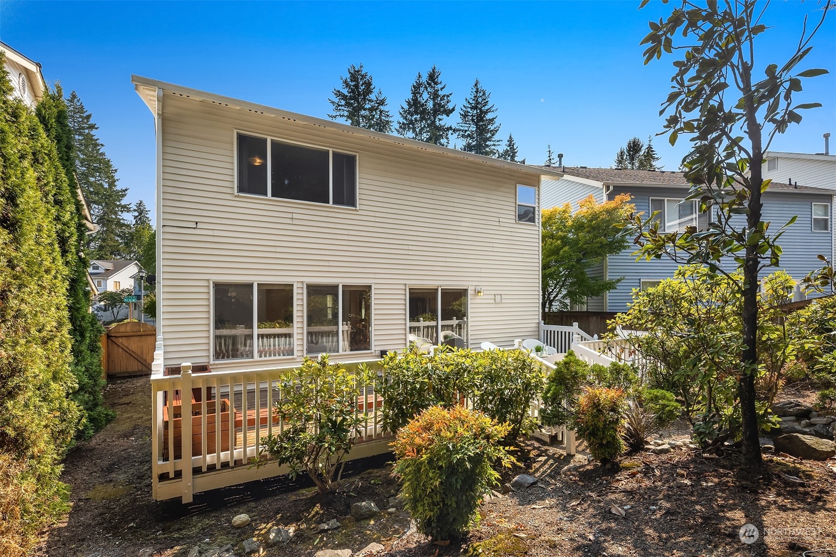 9222 Northeast 173rd Place Bothell, WA 98011 - Photo 30 of 37 a front view of a house with a garden