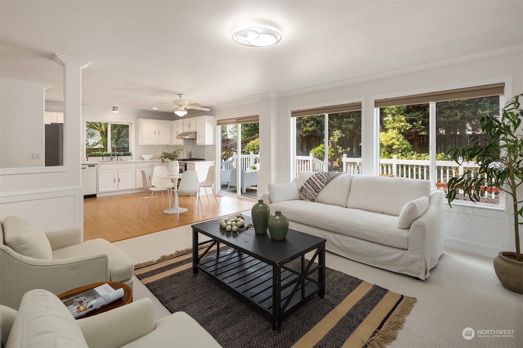 9222 Northeast 173rd Place Bothell, WA 98011 - Photo 3 of 37 a living room with furniture and a large window