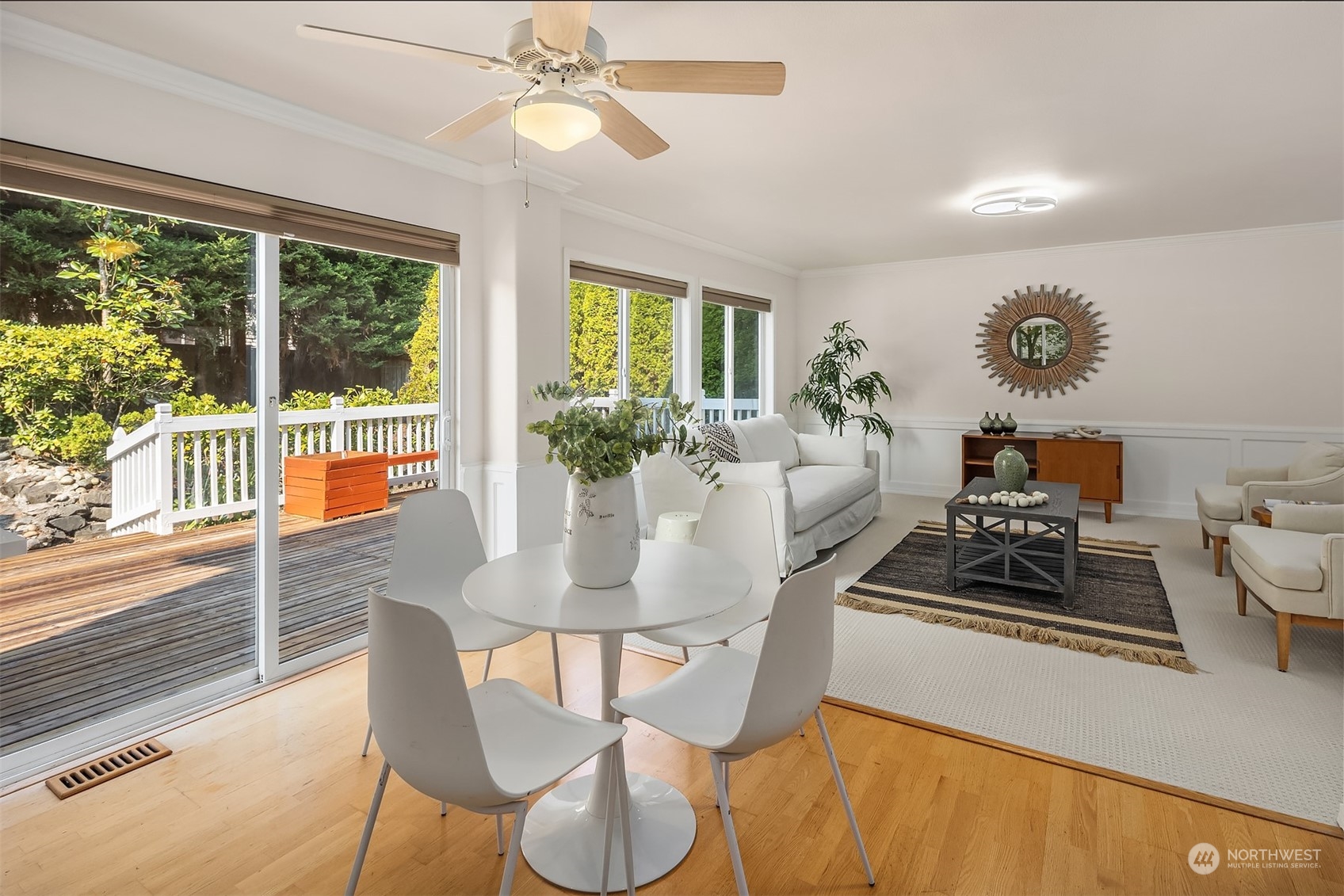 9222 Northeast 173rd Place Bothell, WA 98011 - Photo 8 of 37 a dining room with furniture a chandelier and wooden floor