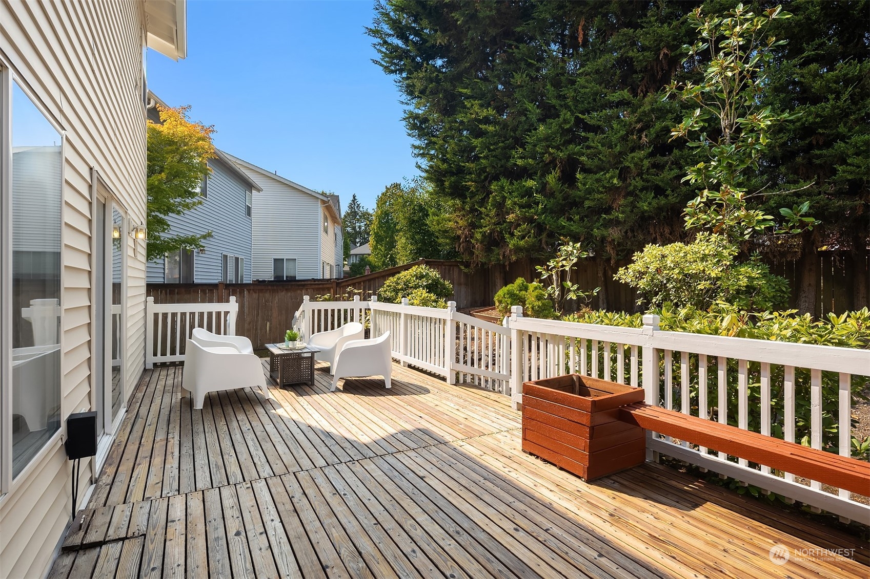9222 Northeast 173rd Place Bothell, WA 98011 - Photo 10 of 37 a view of a roof deck with wooden floor and fence