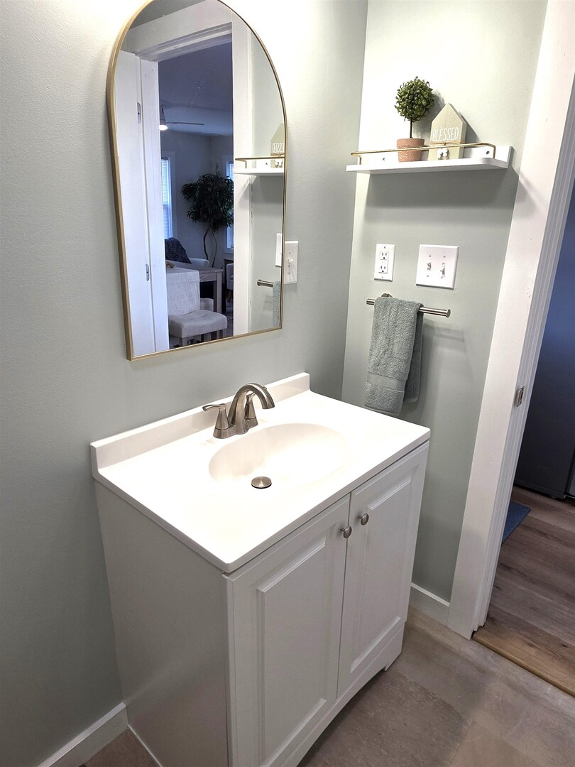 312 Lincoln Avenue Flora, IL 62839 - Photo 62 of 80 a bathroom with a sink and a mirror