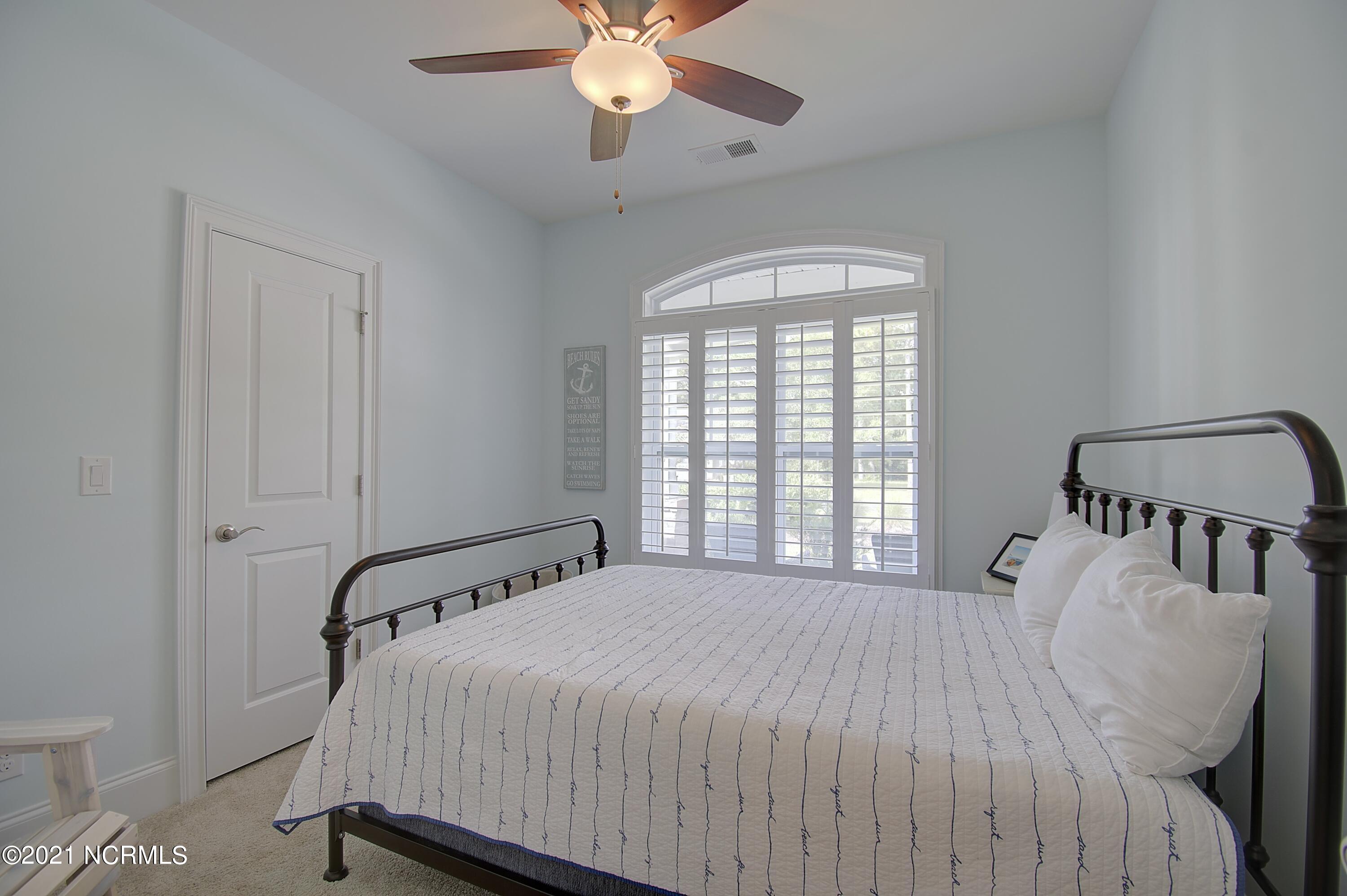 409 Planter's Ridge Drive Sunset Beach, NC 28468 - Photo 15 of 35 BEDROOM 1