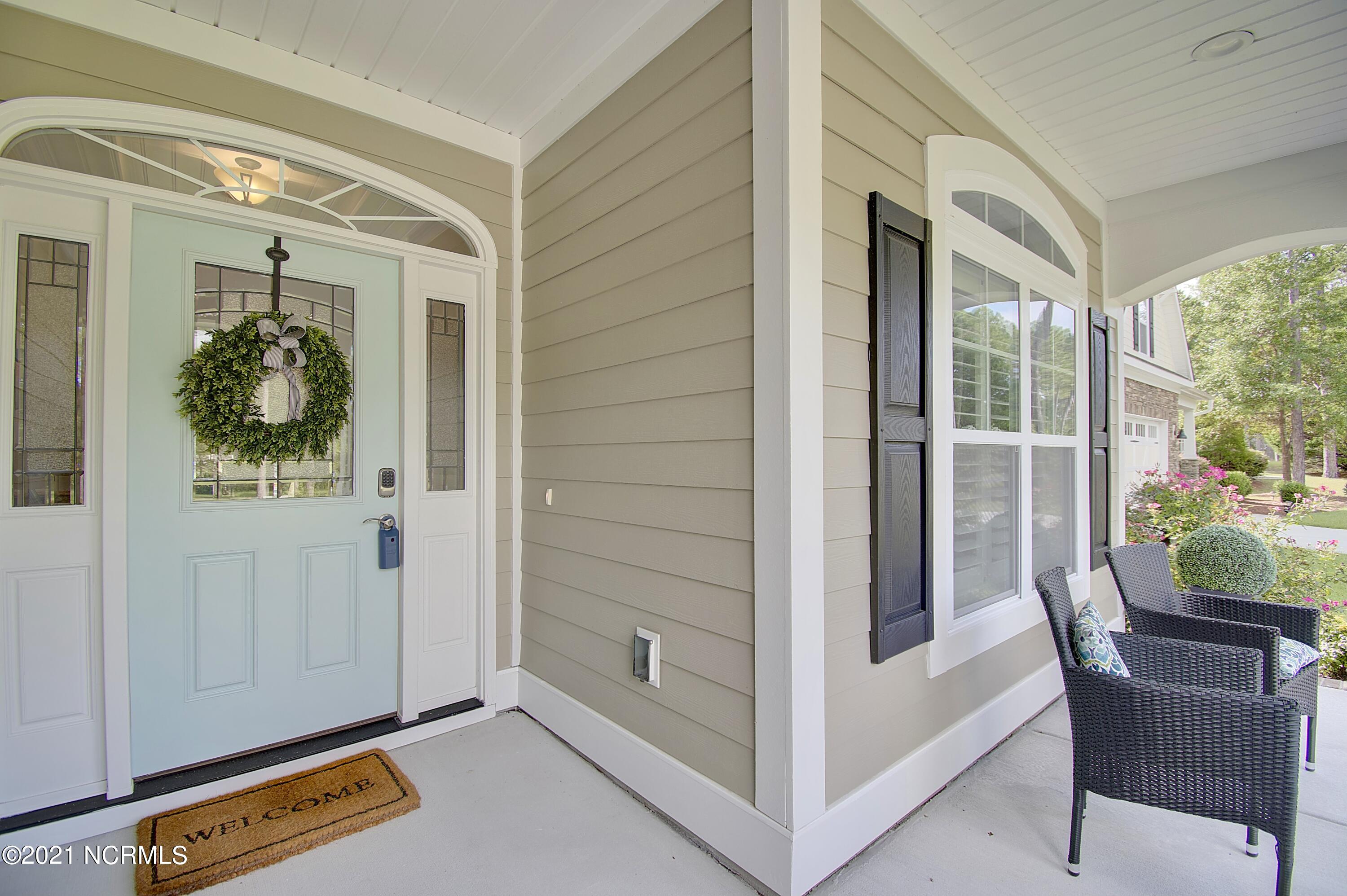 409 Planter's Ridge Drive Sunset Beach, NC 28468 - Photo 2 of 35 FRONT DOOR