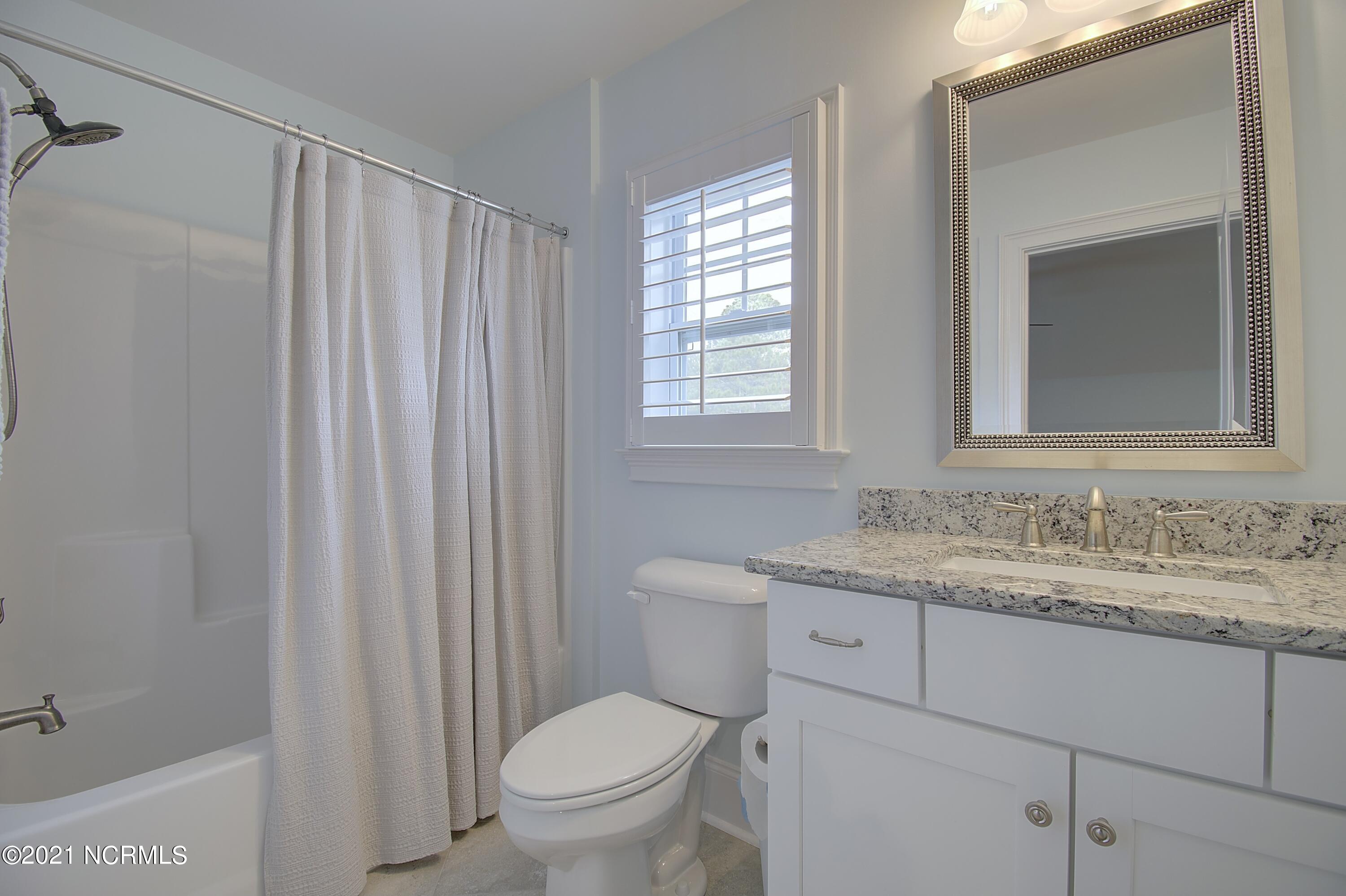 409 Planter's Ridge Drive Sunset Beach, NC 28468 - Photo 22 of 35 BONUS ROOM BATH