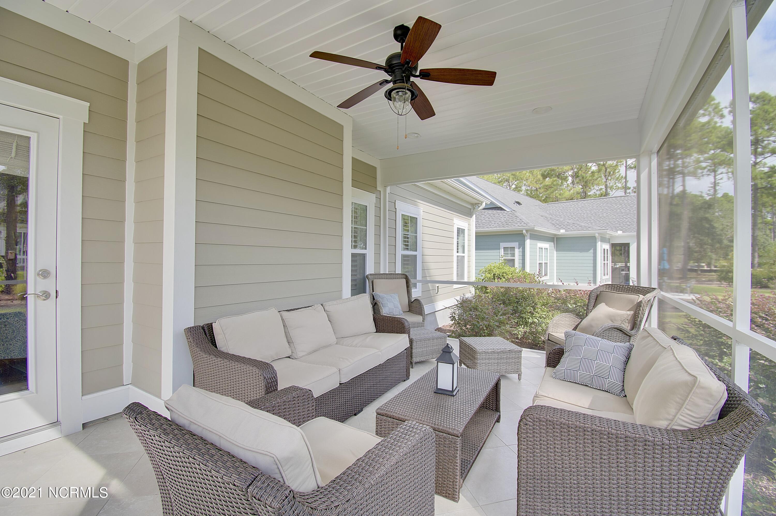 409 Planter's Ridge Drive Sunset Beach, NC 28468 - Photo 26 of 35 SCREENED PORCH