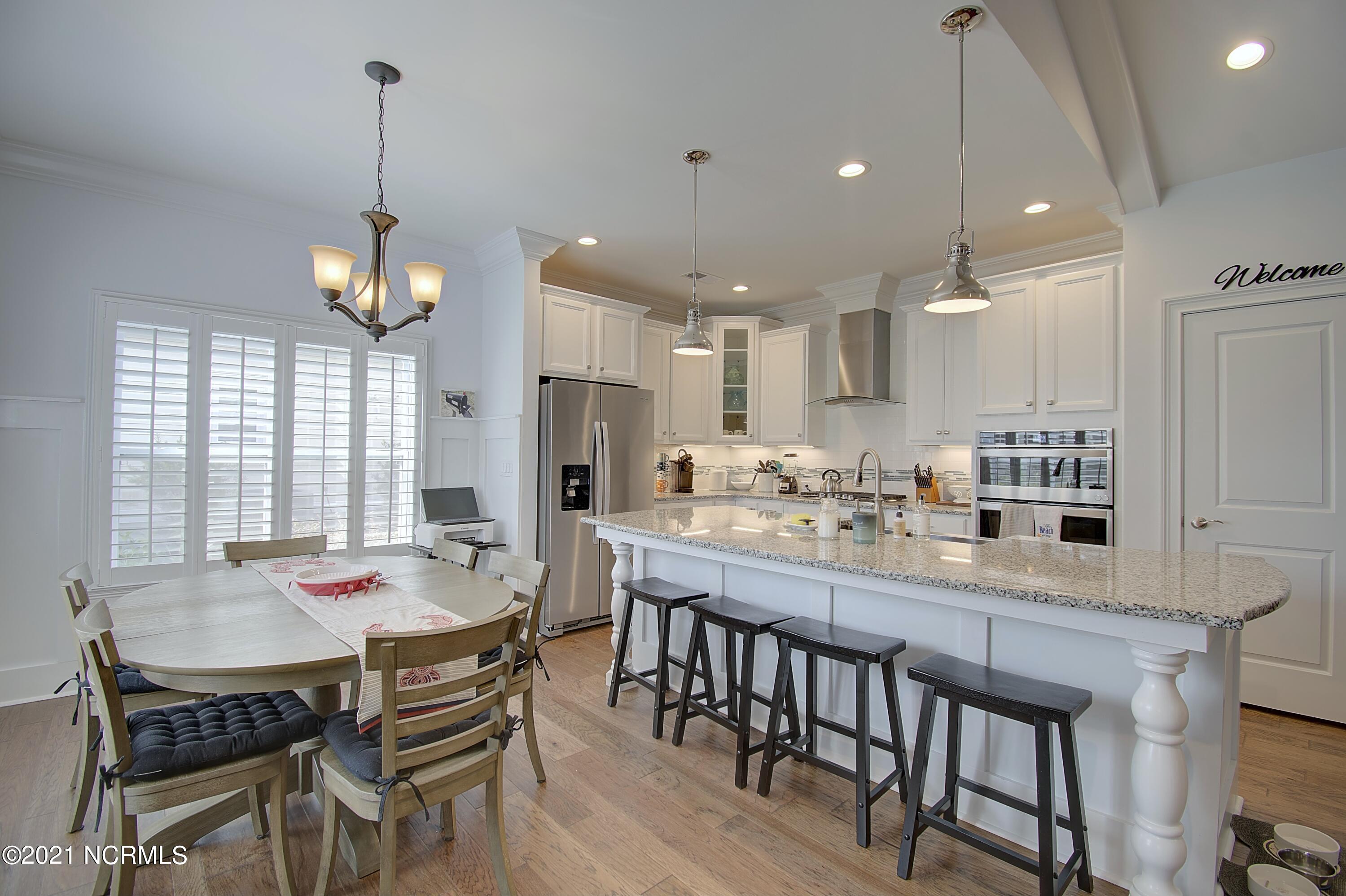 409 Planter's Ridge Drive Sunset Beach, NC 28468 - Photo 9 of 35 DINING AREA