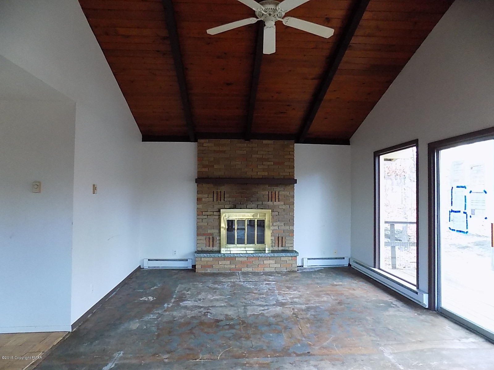 856 Gold Finch Road Bushkill, PA 18324 - Photo 2 of 10 a view of an empty room with windows