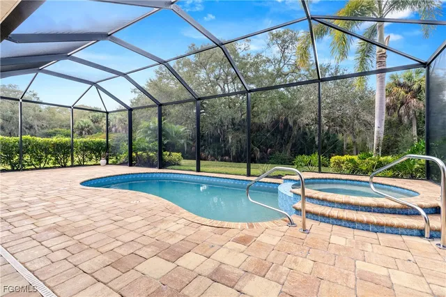 a view of indoor pool and deck