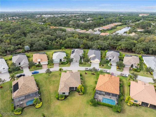 an aerial view of a swimming pool patio and mountain view