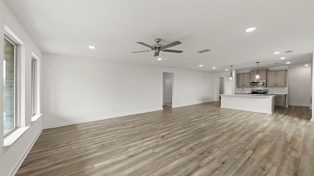 8716 Preakness Street Pilot Point, TX 76258 - Photo 10 of 24 Olive Family Room 3