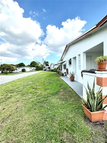 a room with furniture and flat screen tv