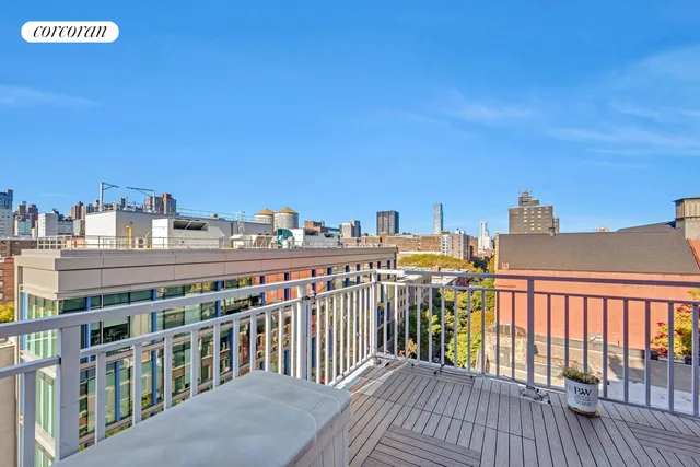 a view of buildings from a balcony