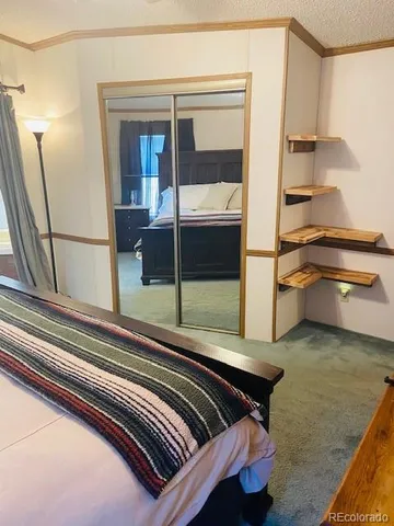 a view of livingroom with furniture and a flat screen tv