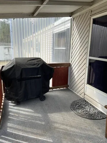 a sign board with street view