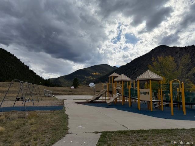54 Windy Gap Loop Empire, CO 80438 - Photo 45 of 48 a front view of a house with garden