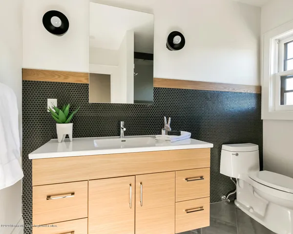 a bathroom with a sink and a toilet