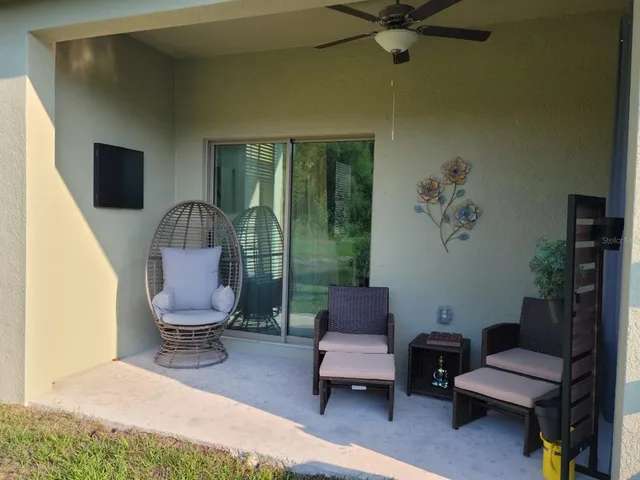 a living room with furniture and a window