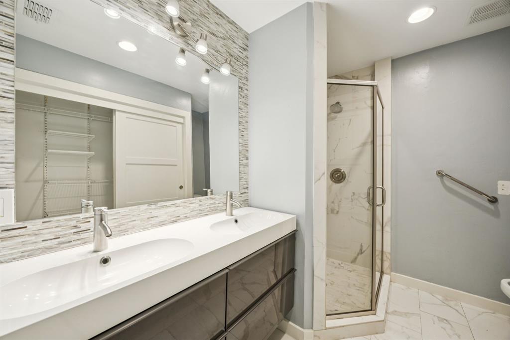 6742 Williamson Road Dallas, TX 75214 - Photo 9 of 11 PRIMARY Ensuite Features Large Vanity With Storage, Expansive Mirror, Double Sinks, Designer Tile Backsplash, Separate Walk-In Tile Surround Shower, Framed Glass Shower Enclosure, Tile Flooring and Accent Lighting