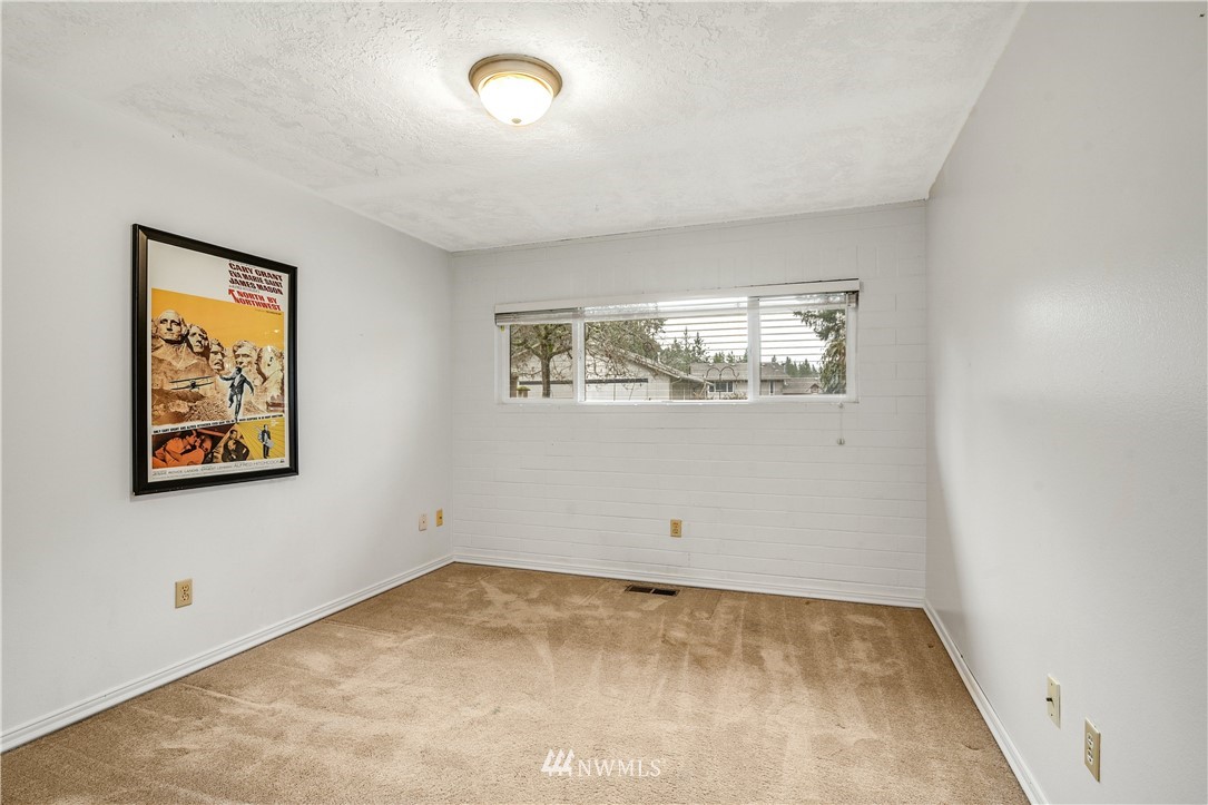 17618 Southeast 293rd Place Kent, WA 98042 - Photo 18 of 35 an empty room with windows