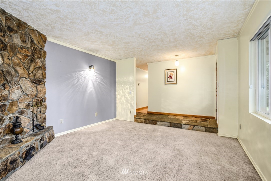 17618 Southeast 293rd Place Kent, WA 98042 - Photo 3 of 35 a view of a livingroom with a staircase