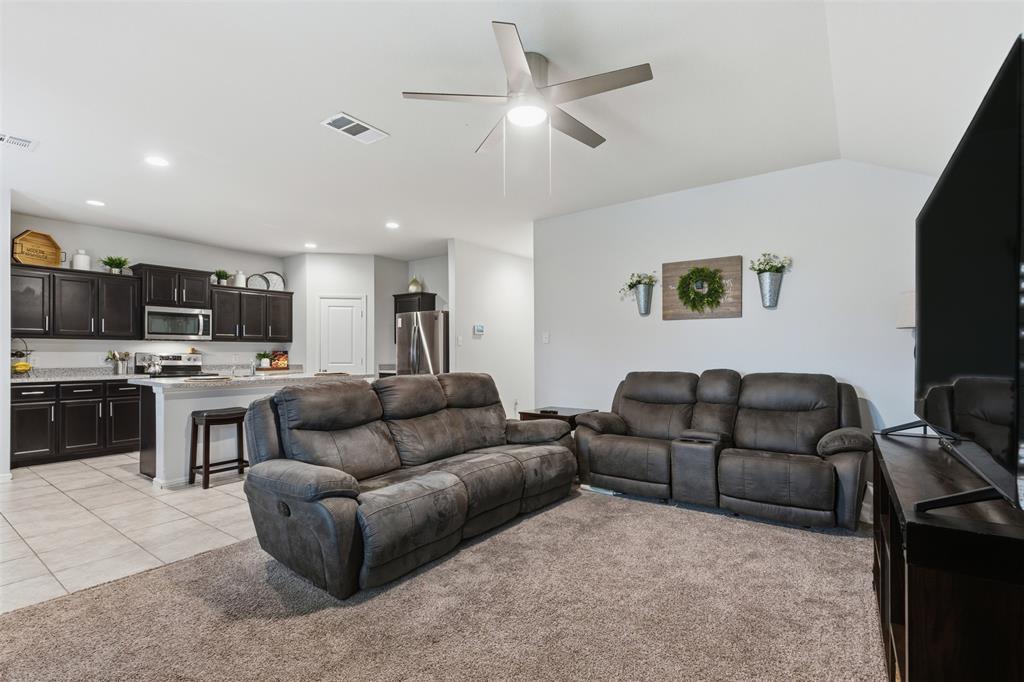 3400 Quiet Valley Road Fort Worth, TX 76123 - Photo 12 of 31 a living room with furniture and kitchen view