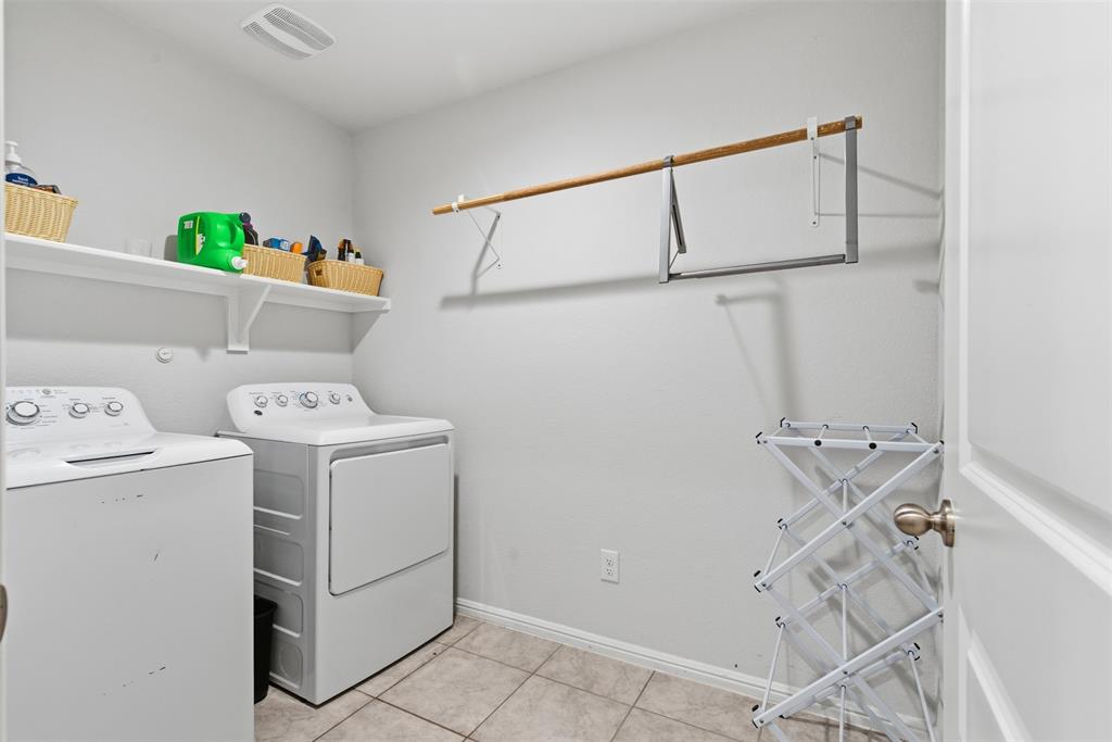 3400 Quiet Valley Road Fort Worth, TX 76123 - Photo 19 of 31 a utility room with dryer and washer