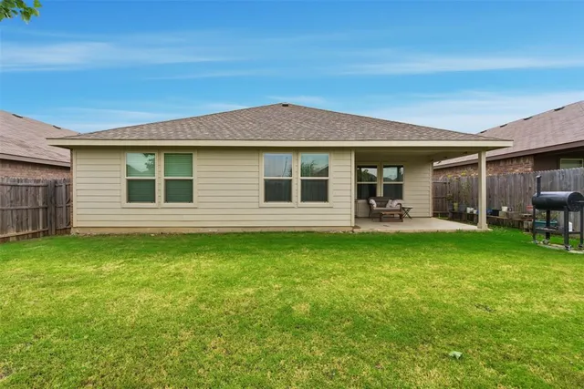 a house view with a garden space