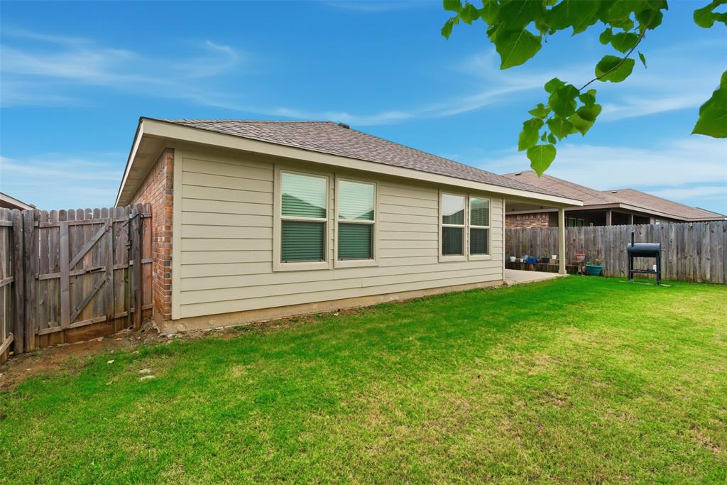 3400 Quiet Valley Road Fort Worth, TX 76123 - Photo 27 of 31 a view of a house with a yard