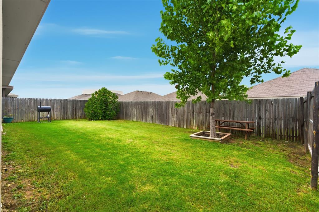 3400 Quiet Valley Road Fort Worth, TX 76123 - Photo 28 of 31 a garden with wooden fence