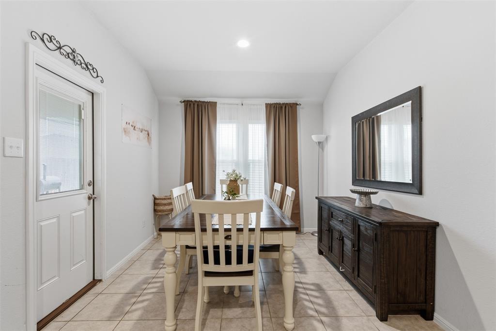 3400 Quiet Valley Road Fort Worth, TX 76123 - Photo 9 of 31 a view of a dining room with furniture and window
