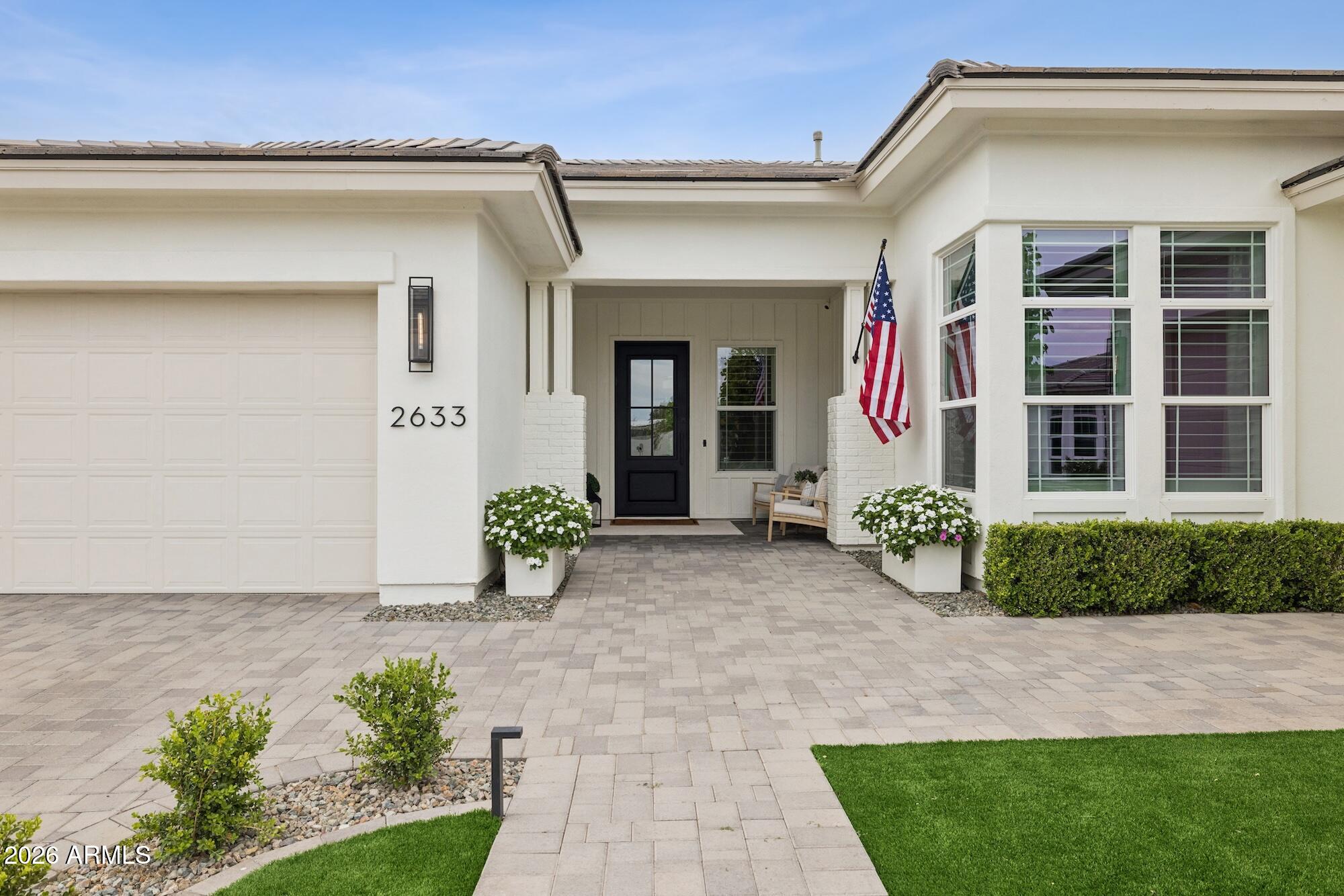 2633 East Geronimo Street Gilbert, AZ 85295 - Photo 2 of 78 a front view of a house with garden