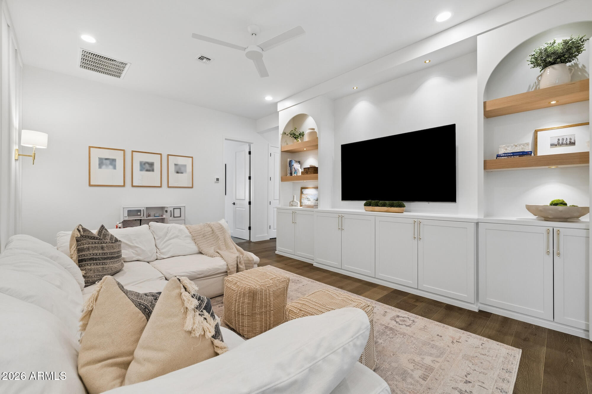 2633 East Geronimo Street Gilbert, AZ 85295 - Photo 35 of 78 a living room with furniture and a flat screen tv