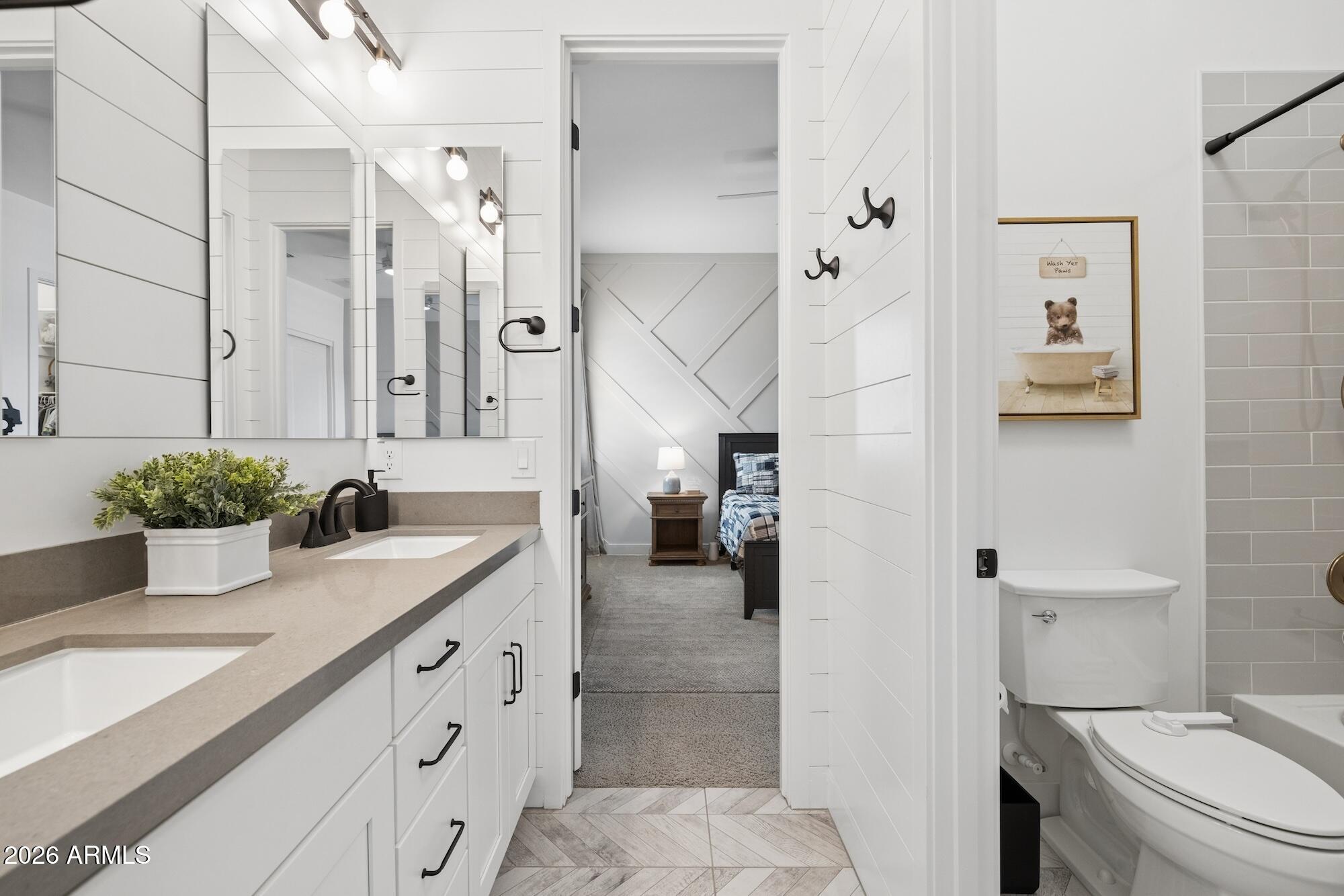 2633 East Geronimo Street Gilbert, AZ 85295 - Photo 40 of 78 a bathroom with a granite countertop sink a toilet and shower