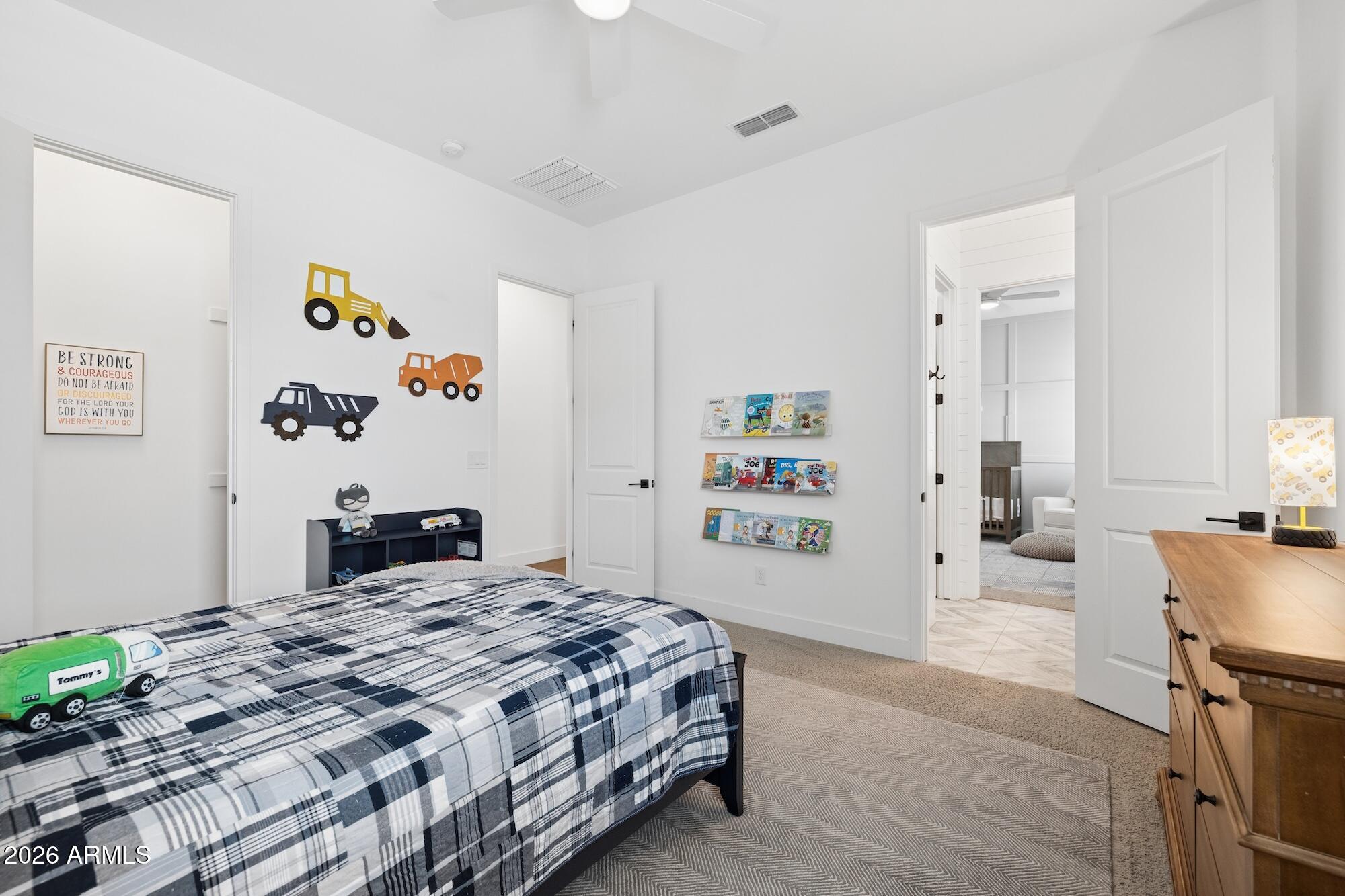2633 East Geronimo Street Gilbert, AZ 85295 - Photo 43 of 78 a bedroom with a bed and a couch