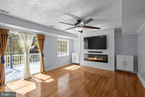 a view of livingroom with hardwood floor and window