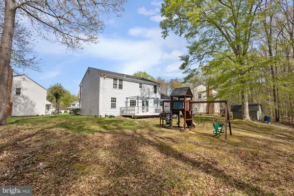 an aerial view of a house with a garden