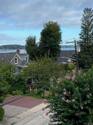 a aerial view of a house with a lake view