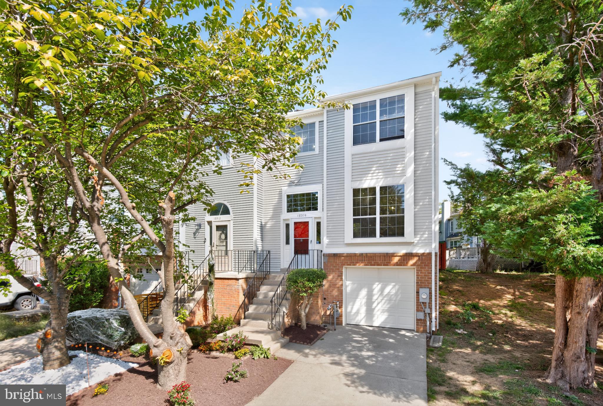 18314 Hallmark Court Gaithersburg, MD 20879 - Photo 1 of 26 a front view of a house with sitting area