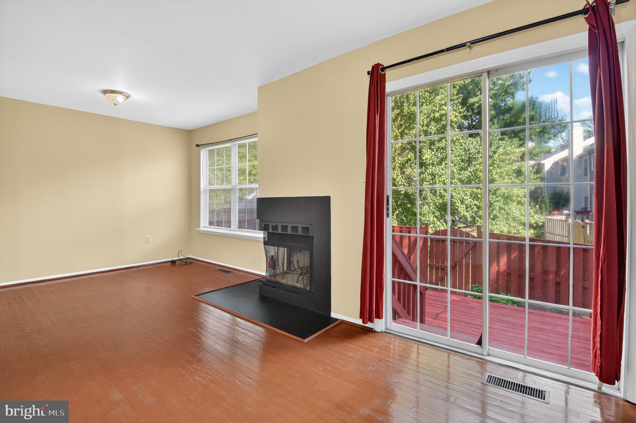 18314 Hallmark Court Gaithersburg, MD 20879 - Photo 11 of 26 a view of empty room with floor to ceiling window and an outdoor kitchen